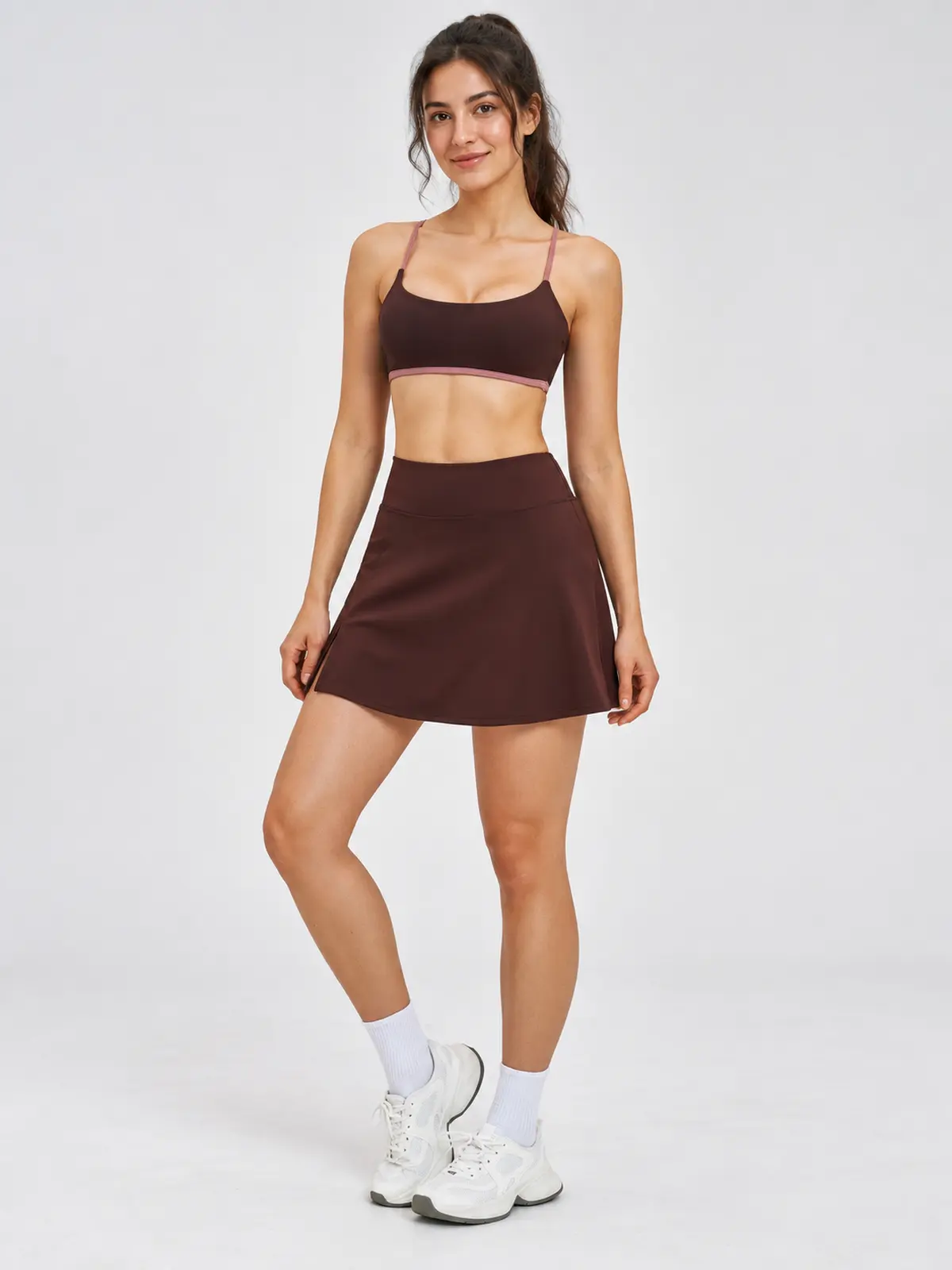 Sable Quill Scoop-Neck Sports Bra and A-Line Skirt Set — dark brown with muted pink trim — general — authoritative variation match