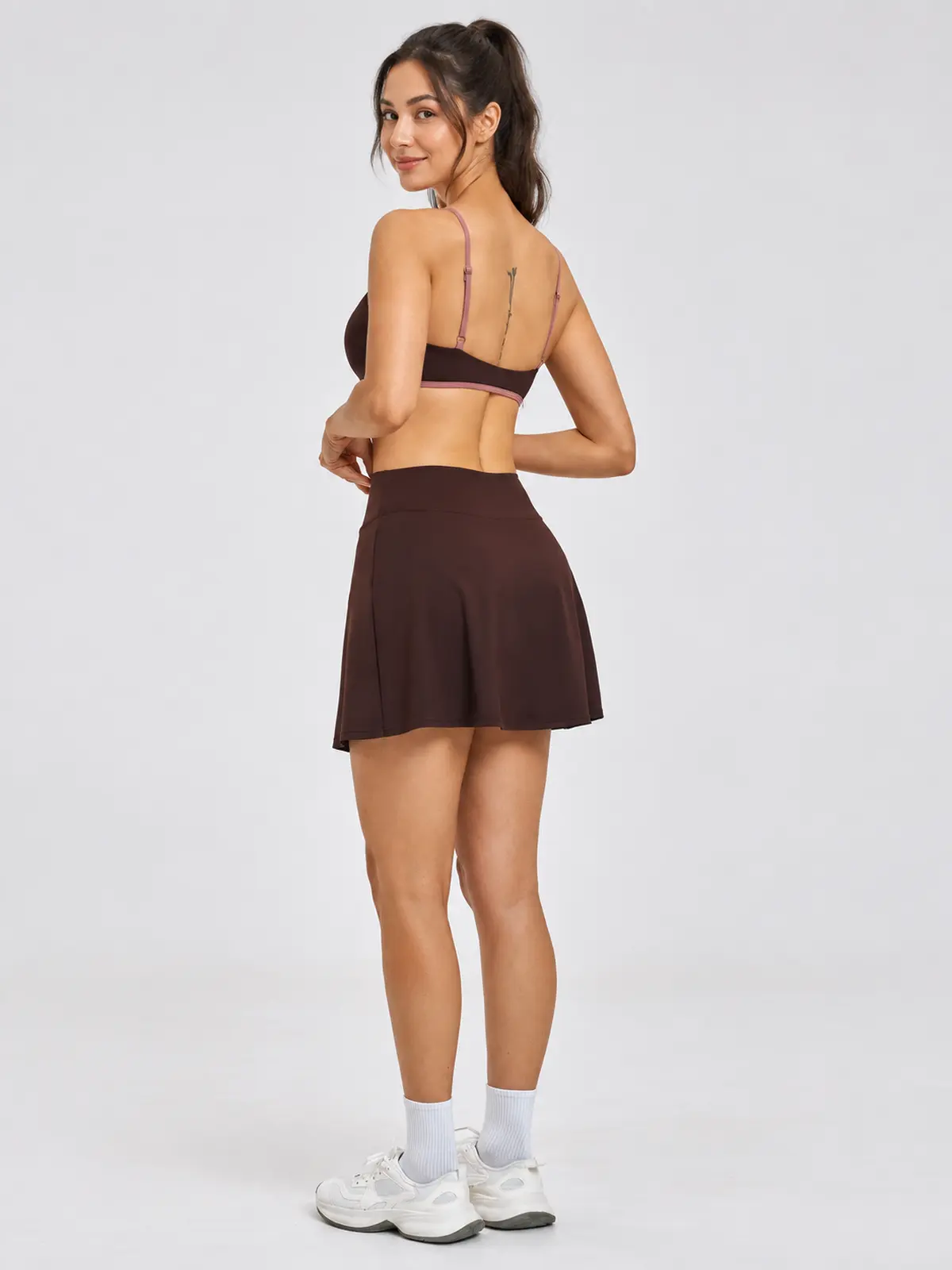 Sable Quill Scoop-Neck Sports Bra and A-Line Skirt Set — dark brown with muted pink trim — general — authoritative variation match