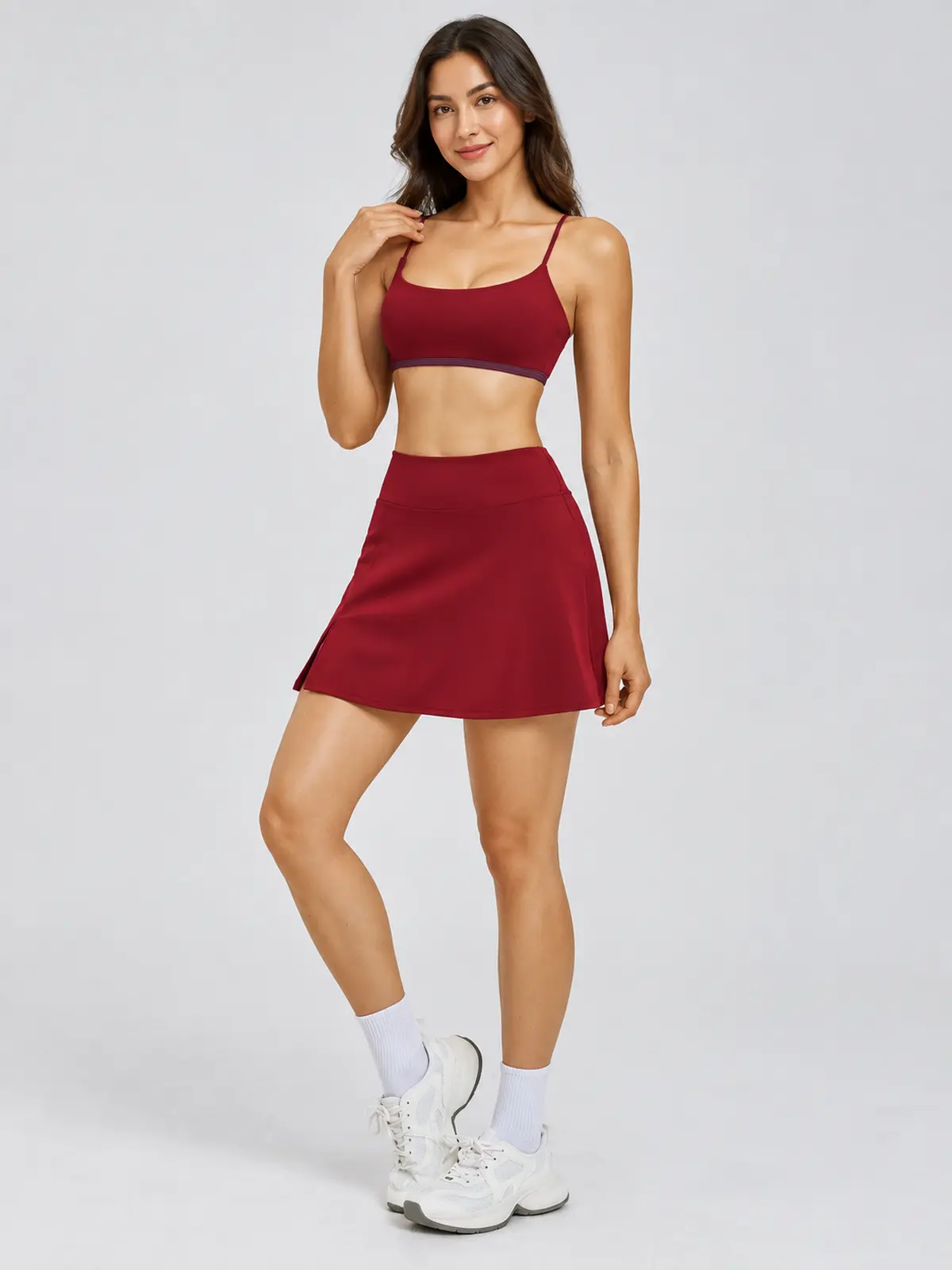Sable Quill Scoop-Neck Sports Bra and A-Line Skirt Set — deep burgundy red with dark purple trim — general — authoritative variation match