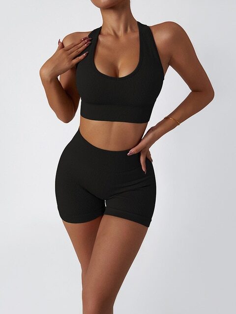 Flaunt Your Figure in This Hot Harmony 2-Piece Shorts & Bra Sports Outfit - Perfect for an Active Lifestyle!