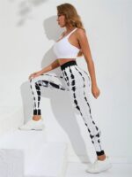 Discover the Perfect Balance of Comfort and Style with Sexy Symmetrical Tie Dye Blast Yoga Leggings!