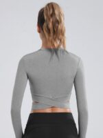 Elevate Your Look with an Intricately Designed Long Sleeve Cross Top Yoga Shirt for Women - Elegance in Symmetry