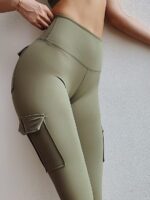 Sizzle in Style with High-Waisted Yoga Pants Featuring Trendy Movement Cargo Pockets - Perfect for Working Out & Lounging!