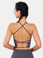 Experience Sexy Harmony with this Cross Back Shockproof Sleeveless Yoga Crop Top - Comfortably Breathable and Stylishly Flexible.