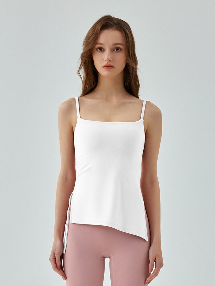 Spirited Style: Compression-Fit Sleeveless Pullover Tank Top with Side Fork Accent - Make a Statement!