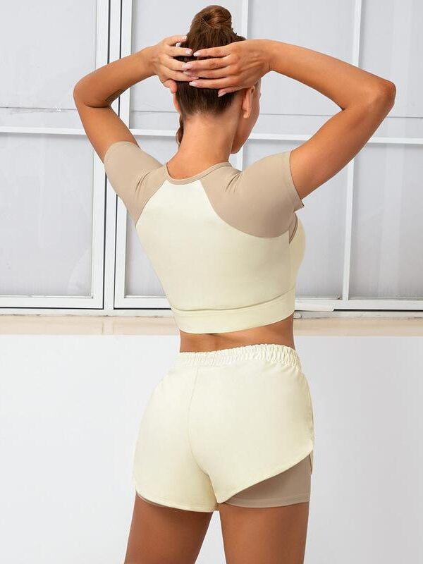 Finesse Your Yoga Look: Trendy Short Sleeve Crop Top & Double Shorts Set