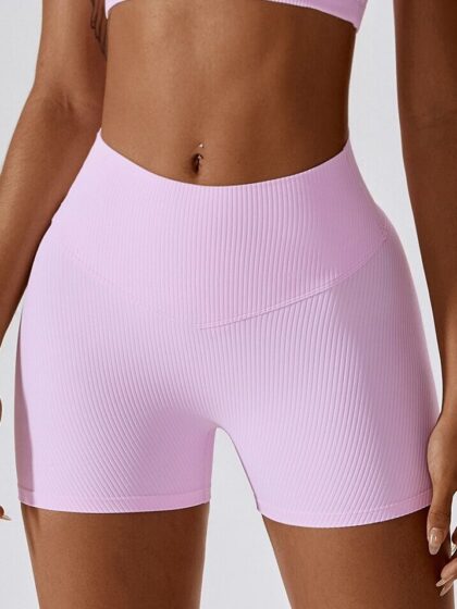 Be the envy of the beach in these Ribbed Lightweight High-Waisted Scrunch Bum Shorts! Show off your curves and feel confident in this flattering and comfortable style. Get ready to turn heads with these must-have