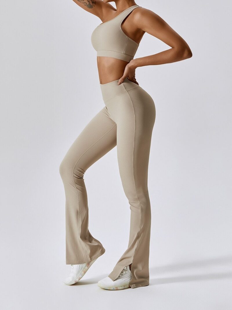 Go for the Win in this Ribbed One-Shoulder Sports Bra and High-Waisted Flared Bottom Pants Set! Look Stylish and Feel Comfortable While You Exercise.