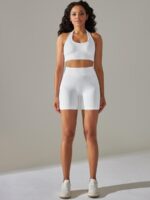 Luxuriate in Style and Comfort with this Halter Sports Bra & High Waisted Shorts Set - Breathable and Stylish Activewear.