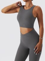 Show Off Your Curves in this Sexy Open-Back Ribbed Crop Top & High-Waist Pocket Leggings Set - Perfect for Any Occasion!