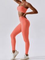 Take your workout to the next level with this sultry Seamless Strappy Sports Bra & High Waist Leggings Set. Crafted with comfort and performance in mind, this breathable activewear set is designed to