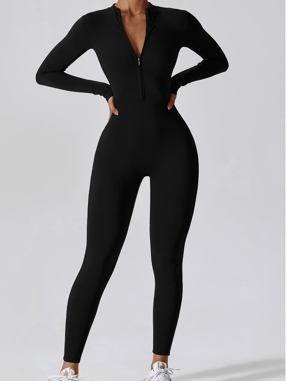 https://valueyoga.co/wp-content/uploads/2023/07/Cozy-Up-in-Style-Ankle-Length-Onesie-with-Long-Sleeves-Zipper-Closure-and-Maximum-Comfort-e1690145986428.jpg