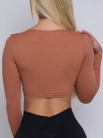 Fashionista-Approved Fierce Deep V-Neck Twisting Padded Long-Sleeve Cropped Top