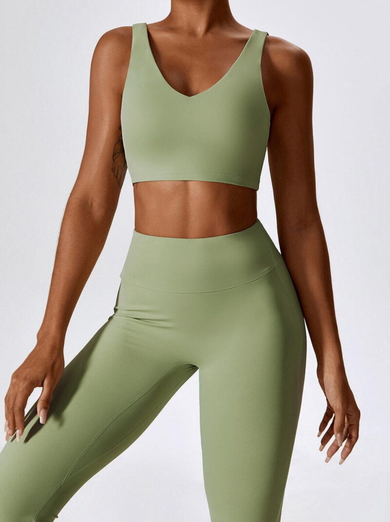 Get Ready to Sweat in Style with our 2-Piece Push-Up Sports Bra & High-Waist Flared Bottoms Pants!
