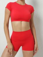 Ready to Work Out? Look Sexy and Confident in this Backless Sports Crop Top & High-Waist Sports Shorts Set! Show Off Your Curves and Feel Comfortable During Your Exercise Routine.