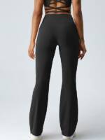 Flaunt Your Curves in These Sexy Flare-Cut High-Waisted Yoga Pants with Strappy Waist Detail!