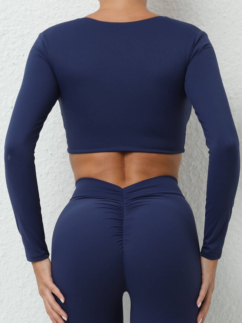 Flirtatious Fitted Long-Sleeve Yoga Crop Top with Soft Padding for Added Comfort