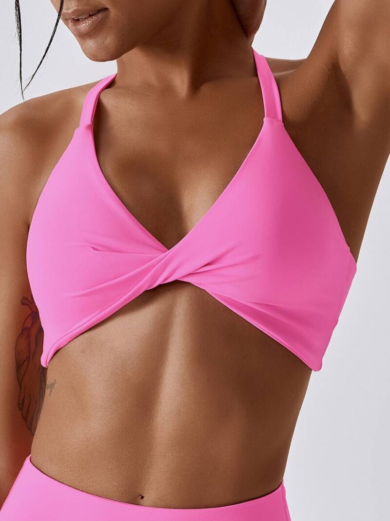Seductive Halter Neck Sports Bra with Flattering Front Twist Detail - Perfect for Working Out or Lounging Around!