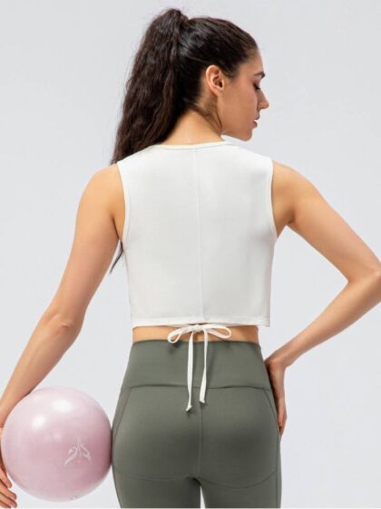 Flex and Flow in Style with this High-Necked Cropped Yoga Tank Top
