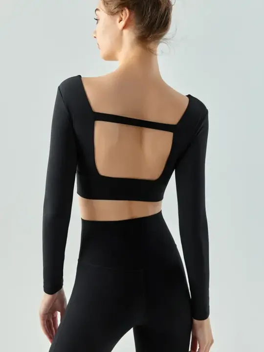 

Sexy Long Sleeve Yoga Crop Top with Ravishing Back Detail - Perfect for Working Out or Turning Heads!