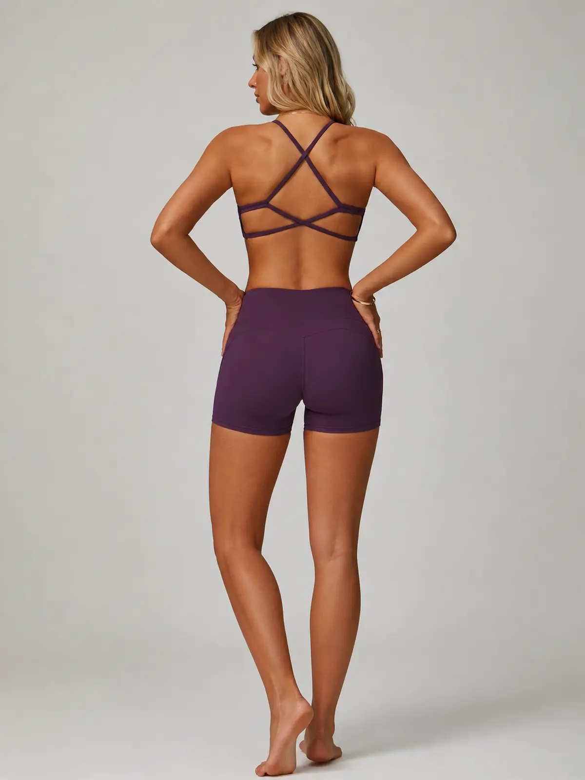 Aubergine Arc Cross-Back Scoop-Neck Sports Bra — dark purple — general — assigned human anchor cluster